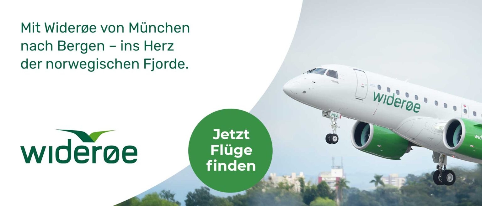 Flugzeug der Airline Widerøe hebt ab, mit einem Hintergrund aus Bäumen und Gebäuden.