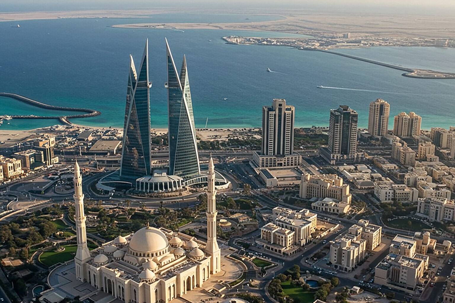 Die Skyline von Bahrain mit modernen Hochhäusern und einer Mosche.