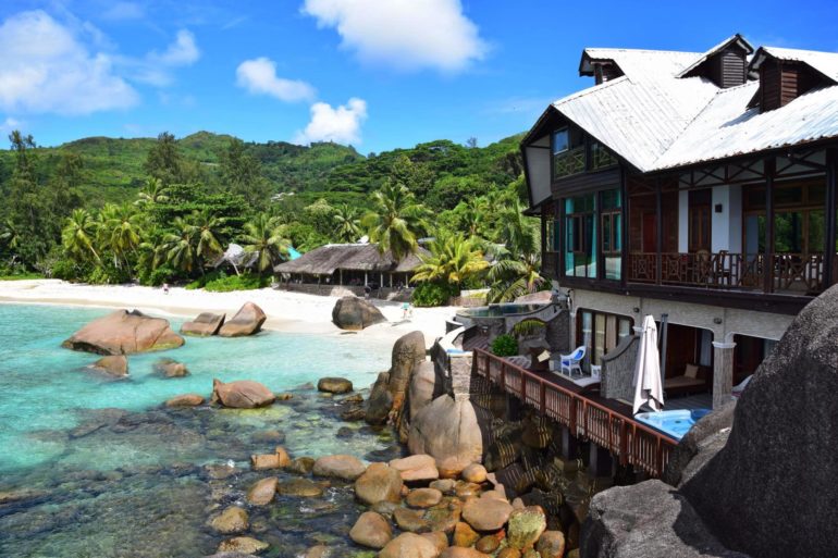 The guest house and restaurant Chez Batista is located directly on the water at Anse Takamaka beach near Mahe in the Seychelles.