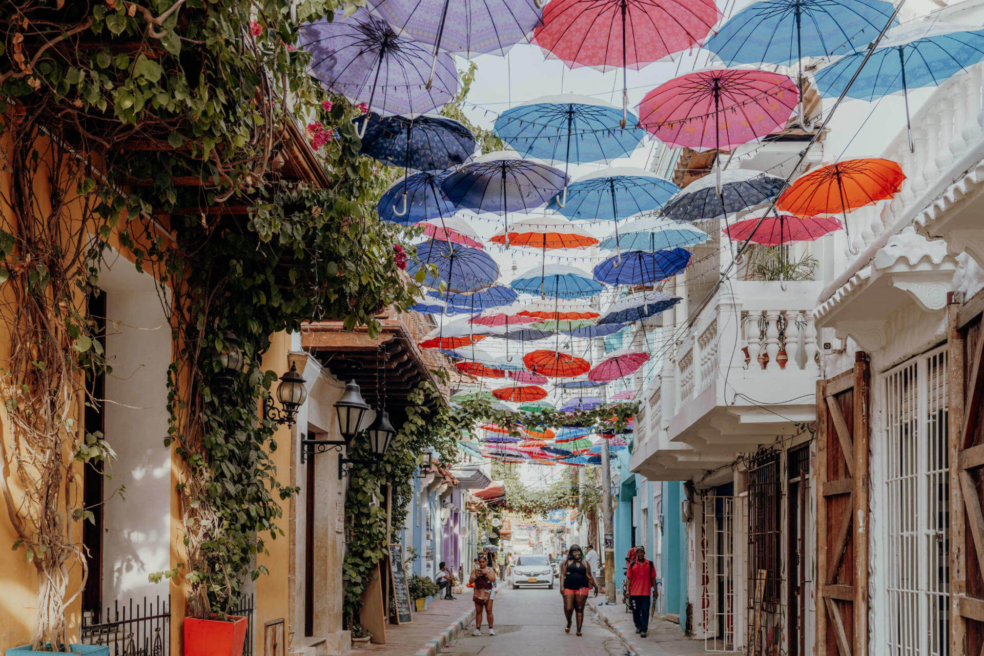 The streets of Cartagena are enchanting. Umbrellas suspended from fairy lights.